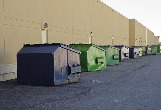 construction waste bins waiting to be picked up by a waste management company in Apple Creek OH